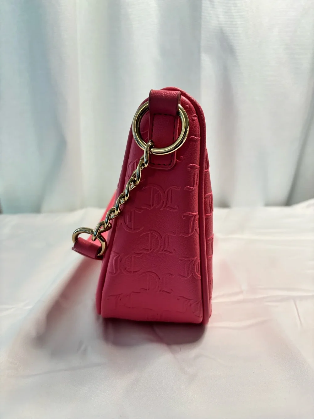 Juicy Couture Embossed hobo Bag with Gold Hardware and Crystal JC Logo